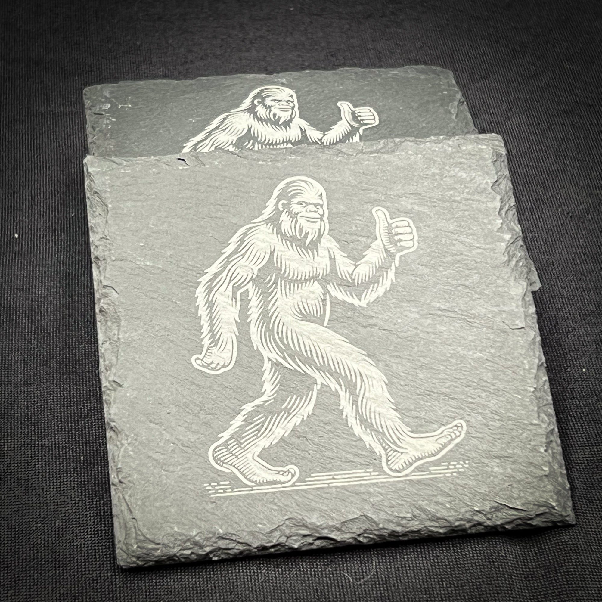 Bigfoot Slate Coaster – 4 Inch Square Natural Slate With Thumbs Up Design