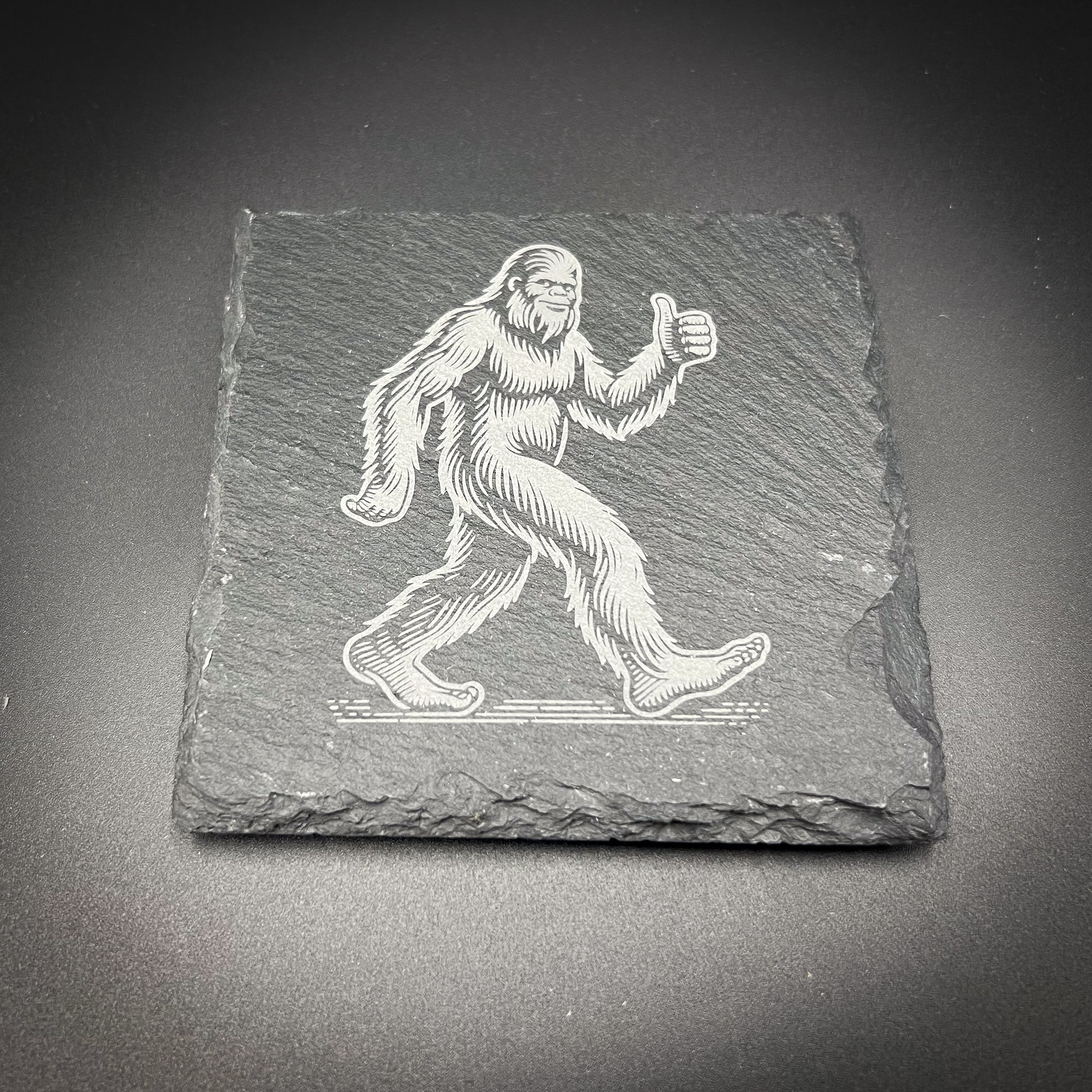 Bigfoot Slate Coaster – 4 Inch Square Natural Slate With Thumbs Up Design