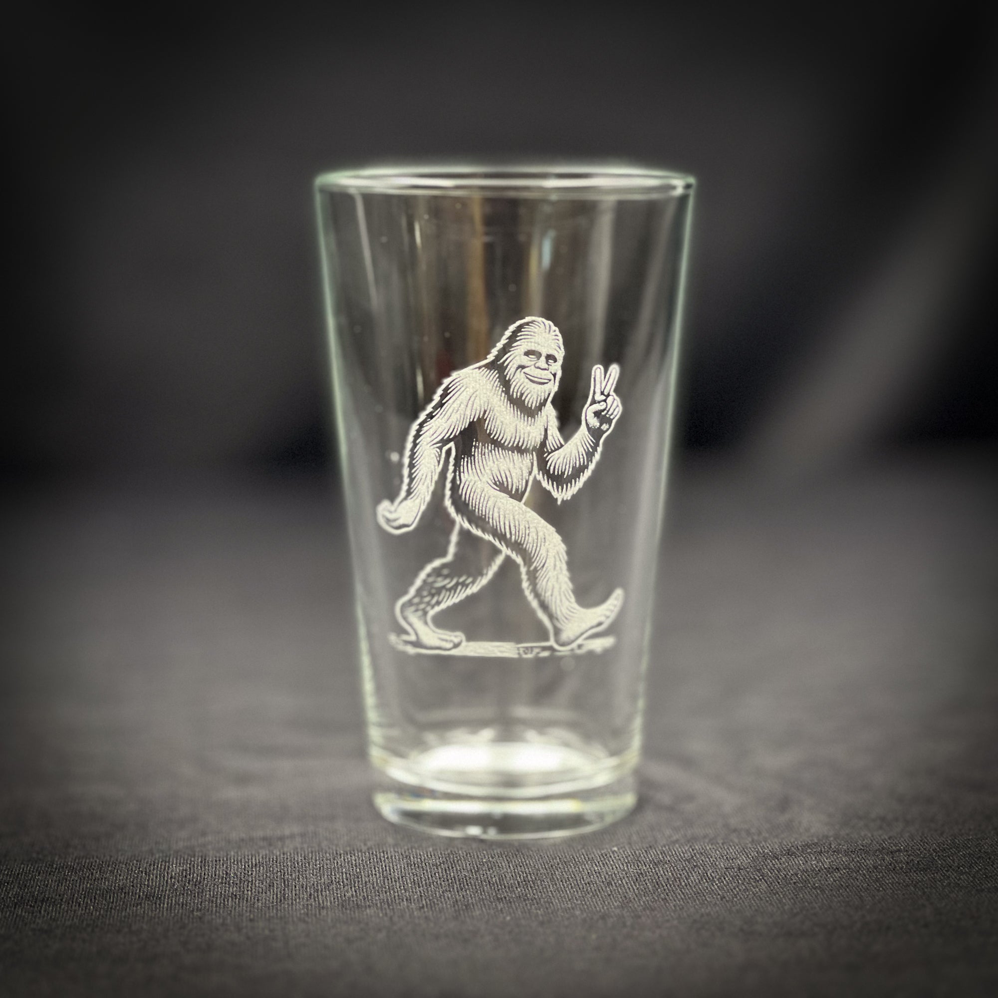Bigfoot With Peace Sign Pint Glass – Etched Durable Beer Glass