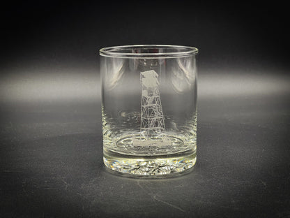 a glass with a picture of a windmill on it