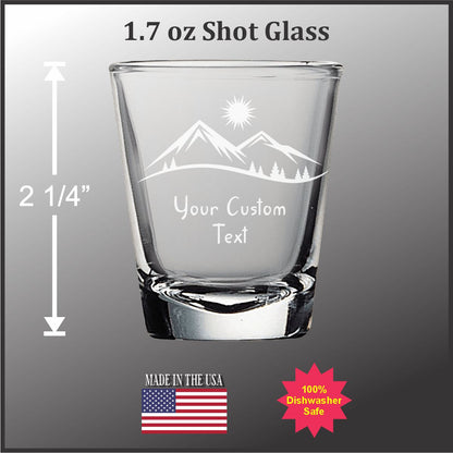 a shot glass with a mountain landscape etched onto it. The shot glass is described as 1.7 oz and is labeled as a custom text shot glass. The image also includes a measurement scale, an American flag, and a red star-shaped sticker with the text "100% Disposable Safe".