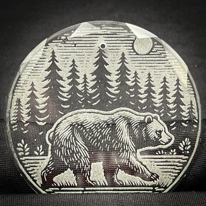 Bear in a Forest Scene  3 1/4" Round Clear Glass Ornament