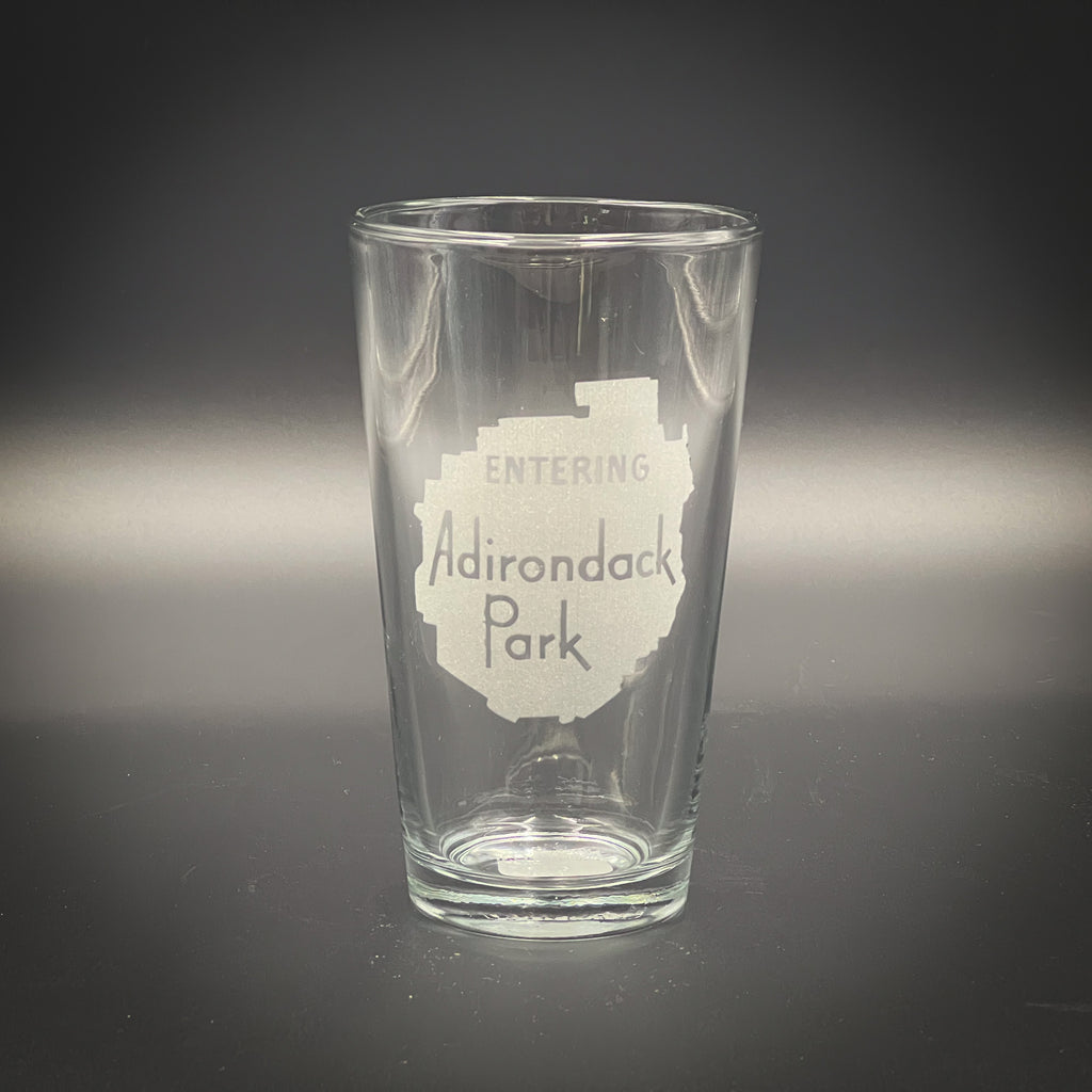 Entering the ADK Sign  Pint Glass