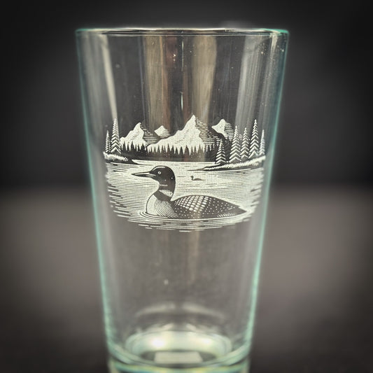 Loon on a Lake with Mountains - Pint glass Ready for pick up