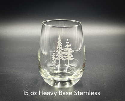 a clear glass with white trees on it