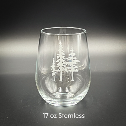 a clear glass with white trees on it