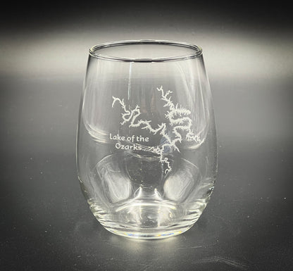 a wine glass with the words lake of the woods etched on it