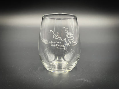 a clear glass with white writing on it