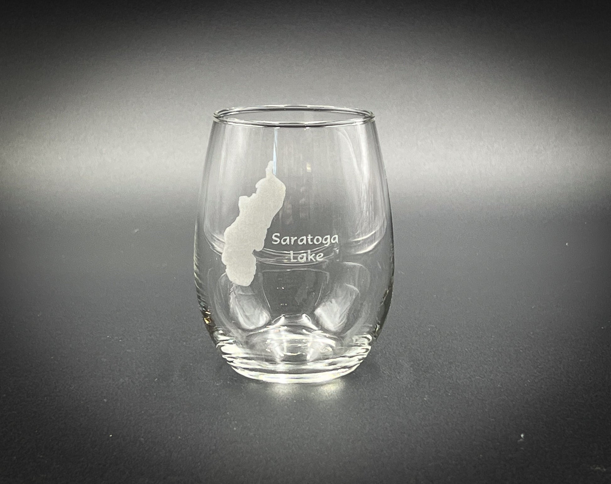 a clear glass with a white bear on it
