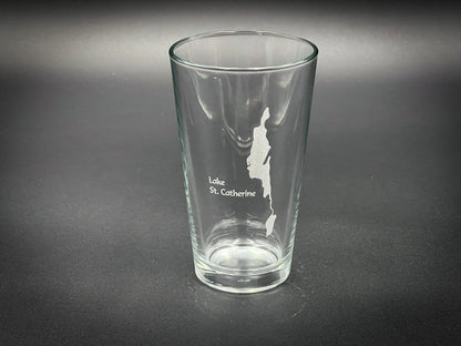 a shot glass with a silhouette of a man on it