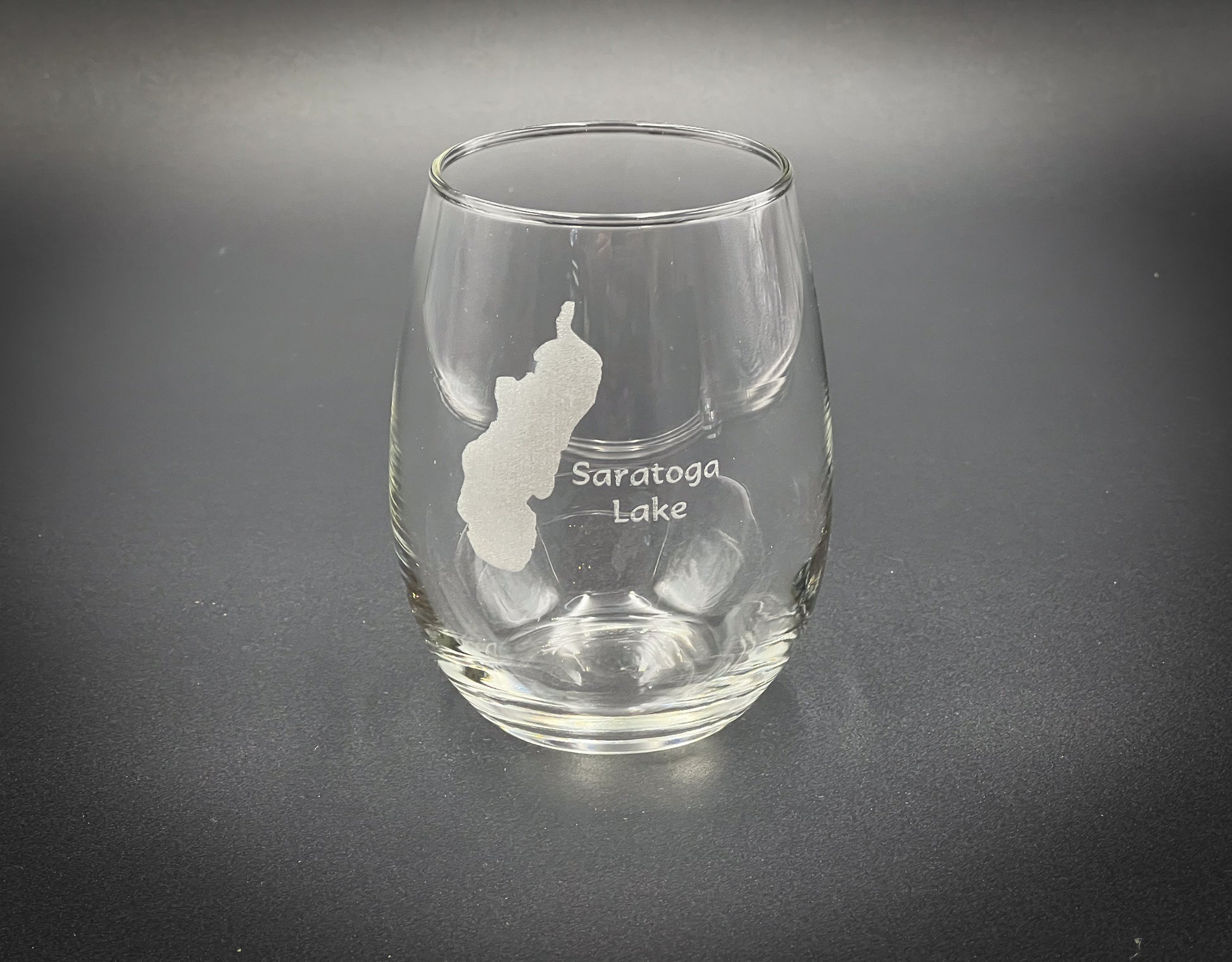 a wine glass with a silhouette of a woman on it