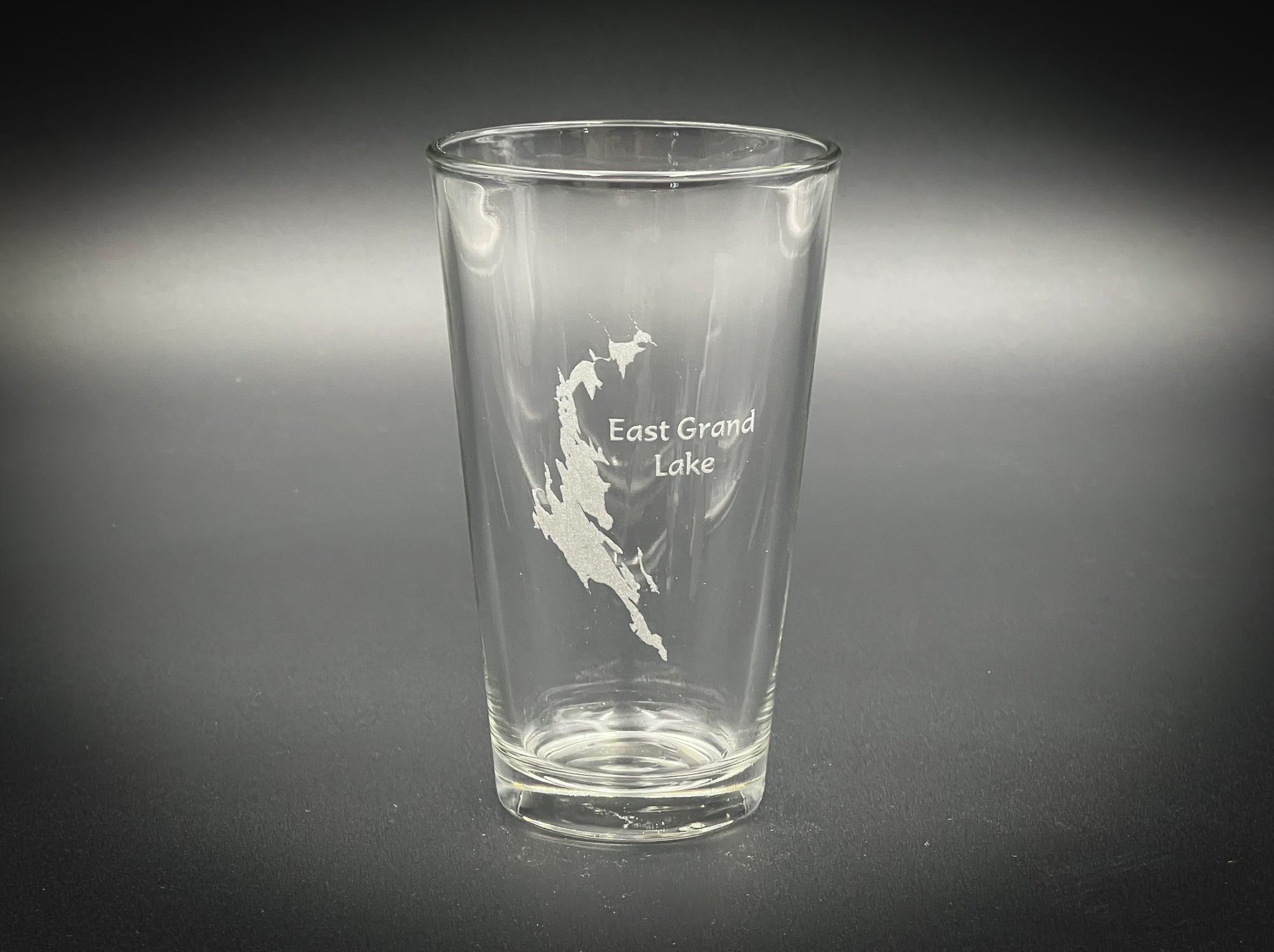 a shot glass with a map of the east coast on it