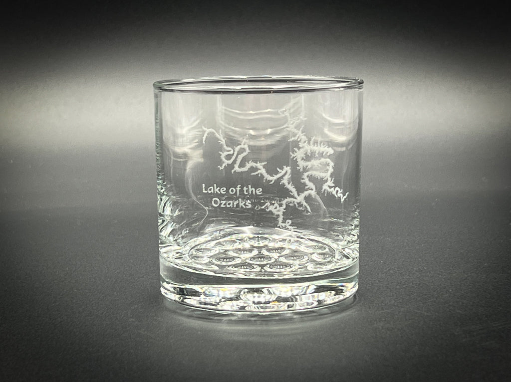 a glass with a picture of a dragon on it