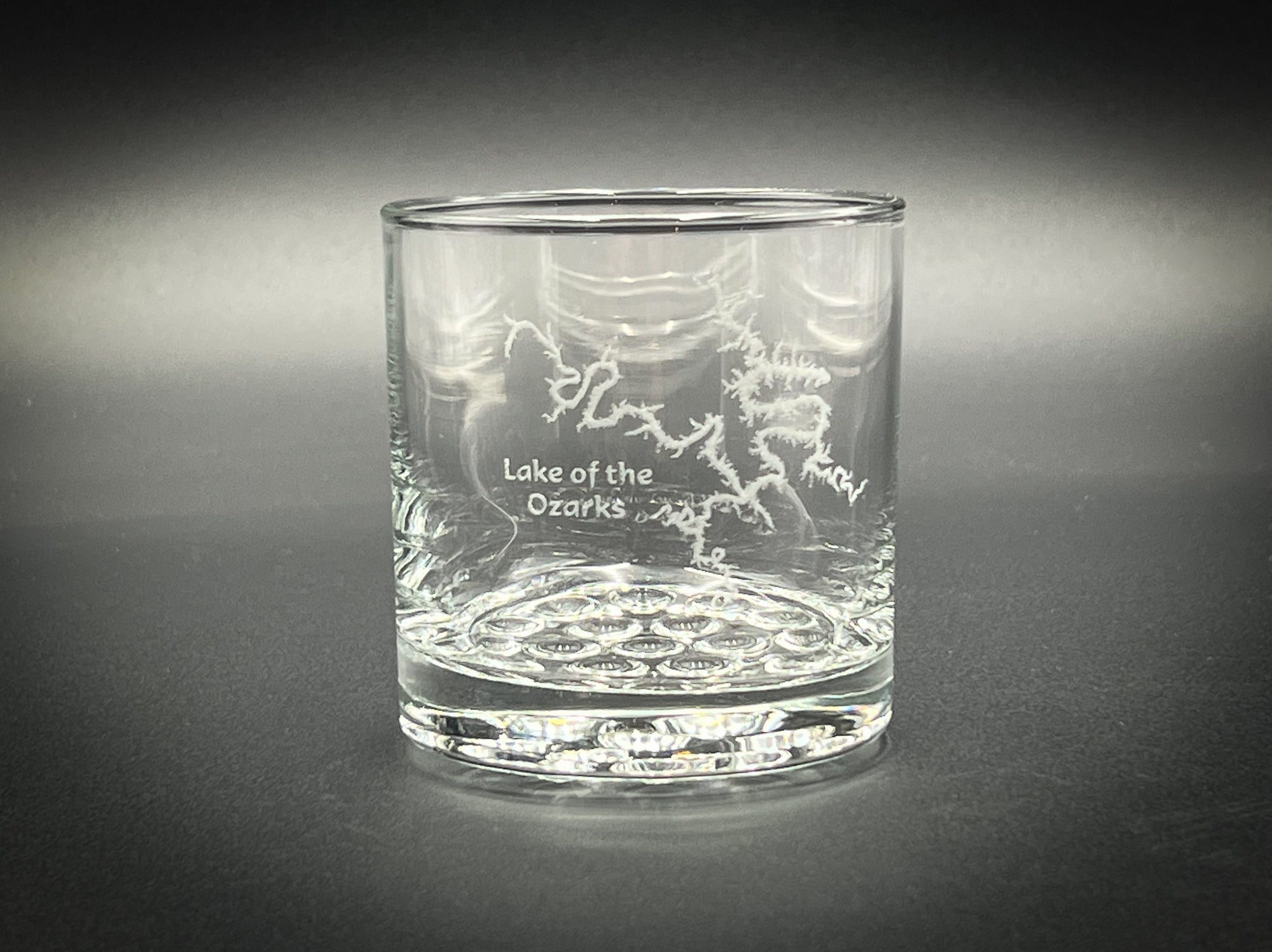 a glass with a picture of a dragon on it