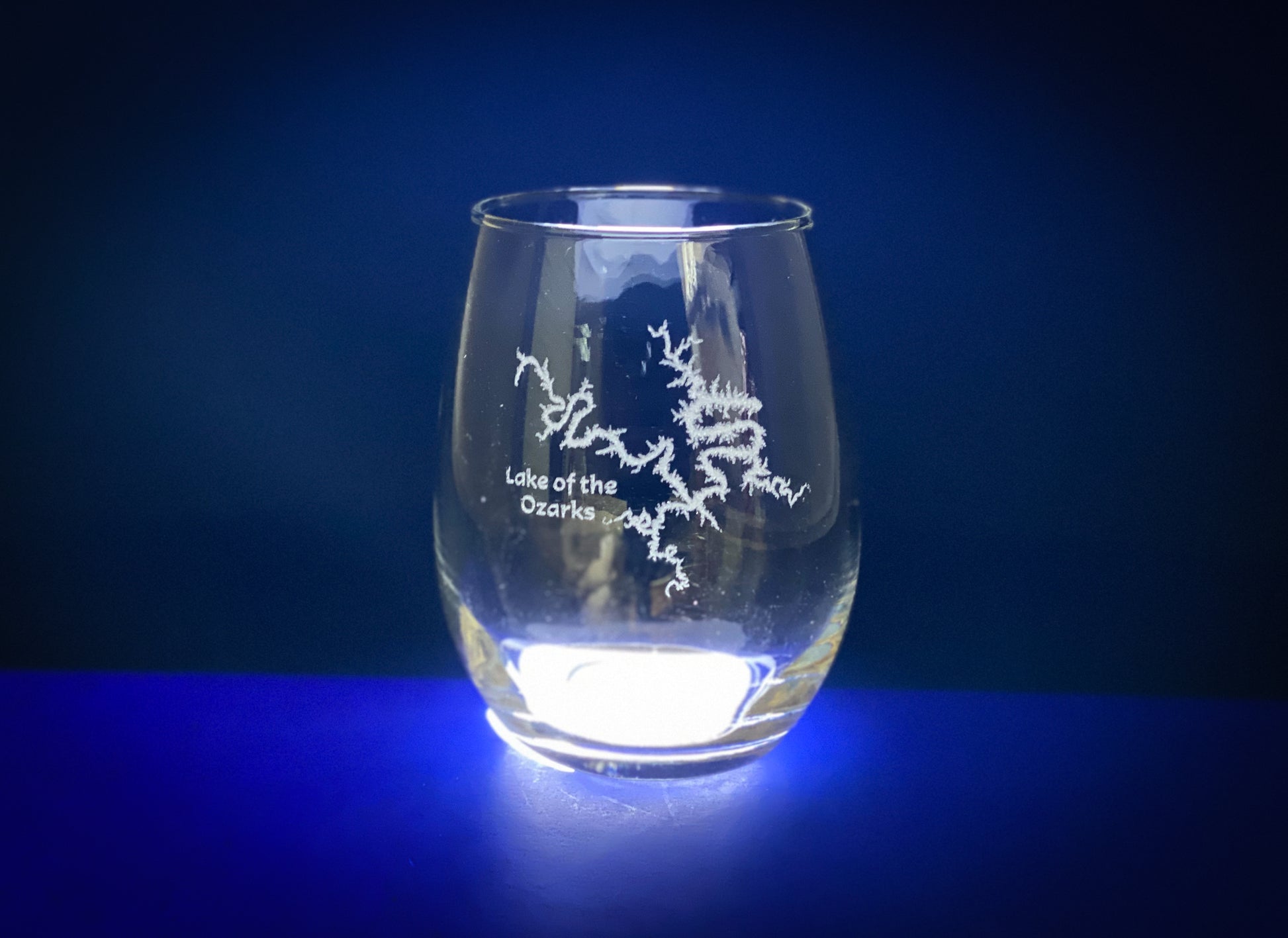 a glass with a picture of a tree on it